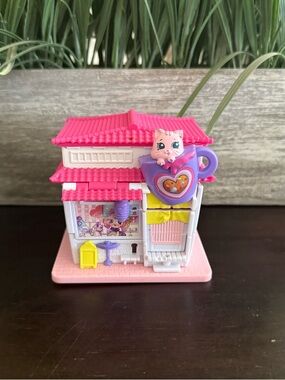 Shopkins Lil' Secrets Secret Shop playset, specifically the Cutie Cat Café